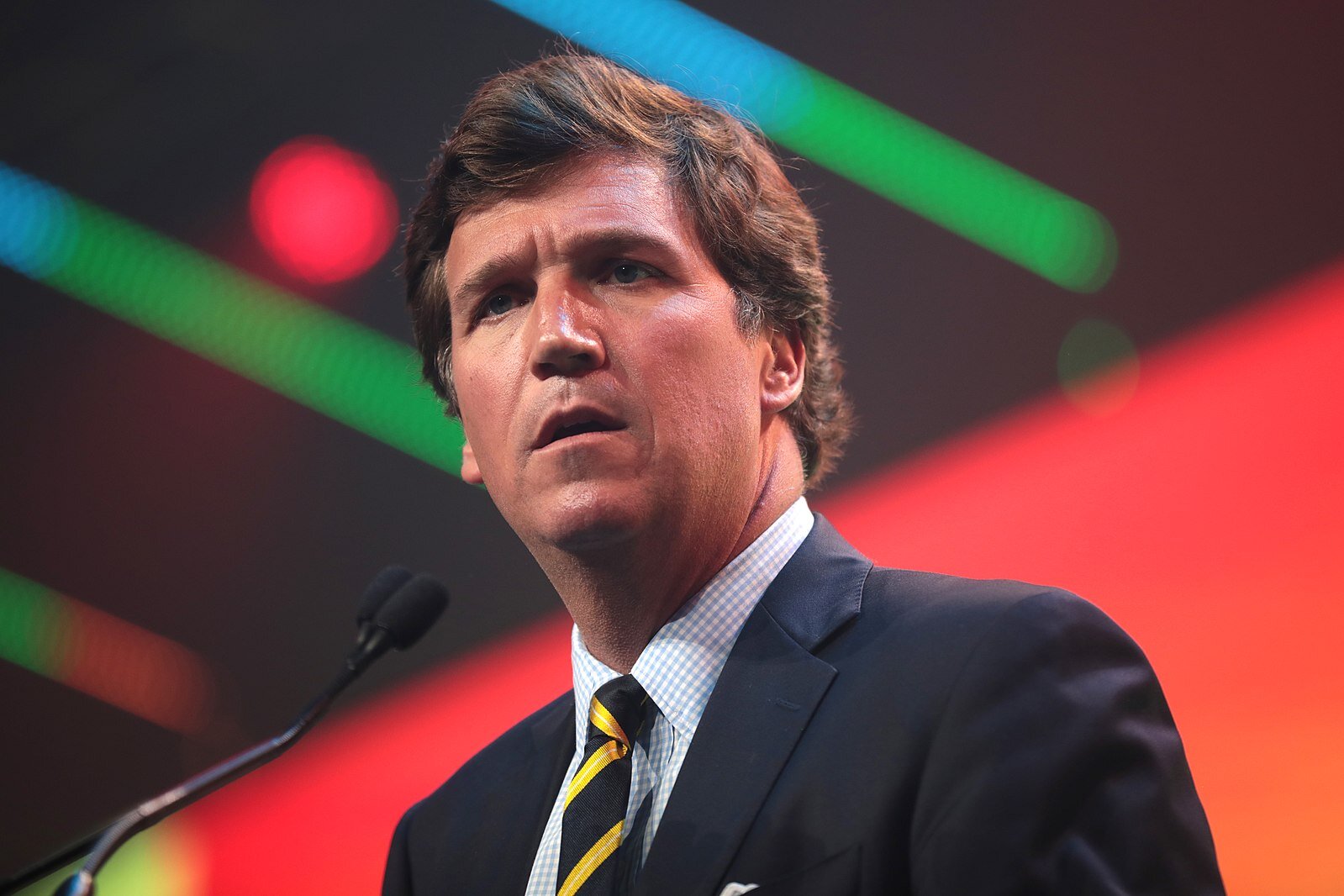 December 19th, 2020 – Tucker Carlson speaking with attendees at the 2020 Student Action Summit hosted by Turning Point USA at the Palm Beach County Convention Center in West Palm Beach, Florida. (Photo by Gage Skidmore | Wikimedia Commons)