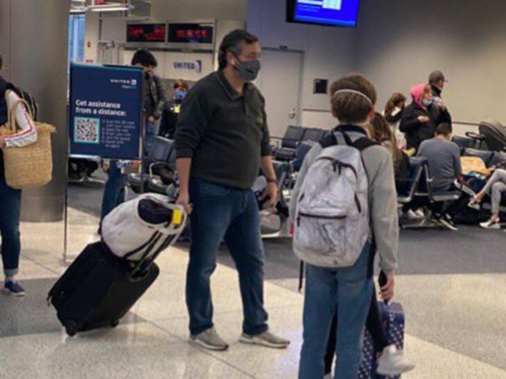 Photos of Senator Cruz began circulating on Twitter after he was spotted leaving the country at Houston International Airport (Twitter/@gabehudson)