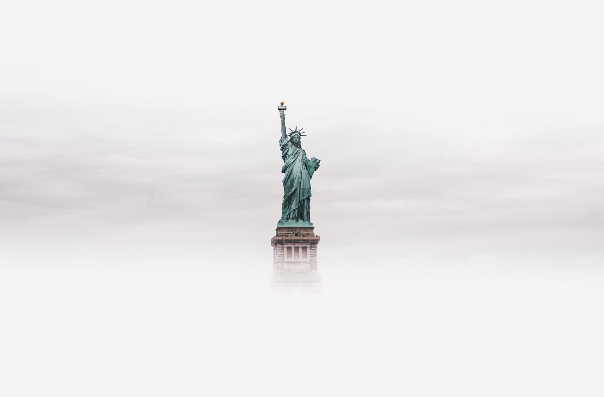 Statue of Liberty National Monument, New York, United States (Photo by Luke Stackpoole | Unsplash)