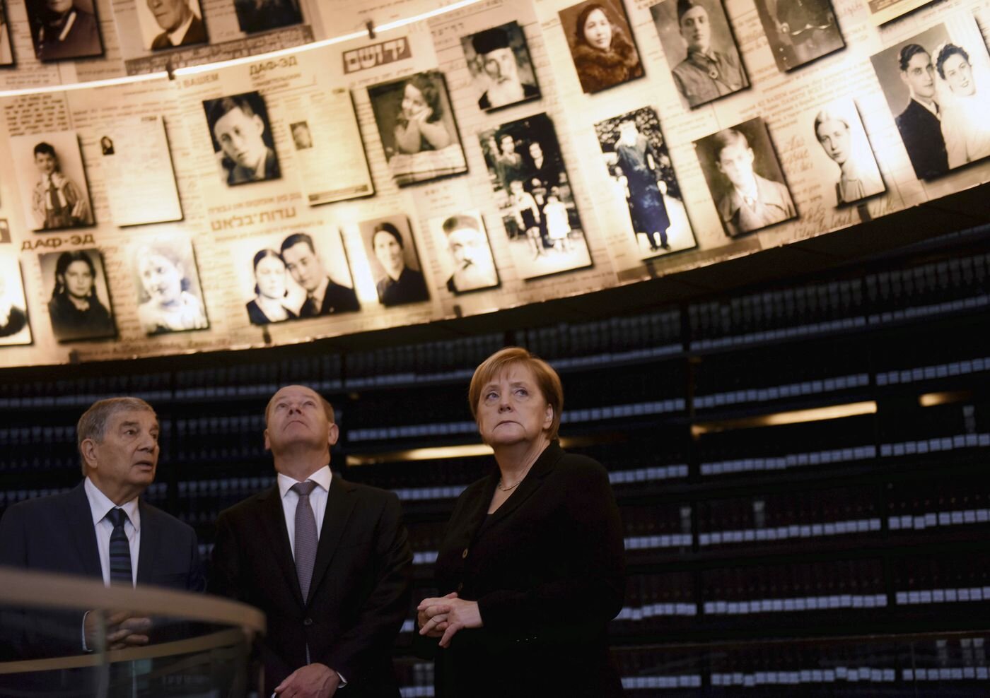 German Chancellor Angela Merkel visits the Hall of Names in the Yad Vashem Holocaust Museum in Jerusalem, Israel, Thursday Oct. 4, 2018. (Debbie Hill/Pool via AP)